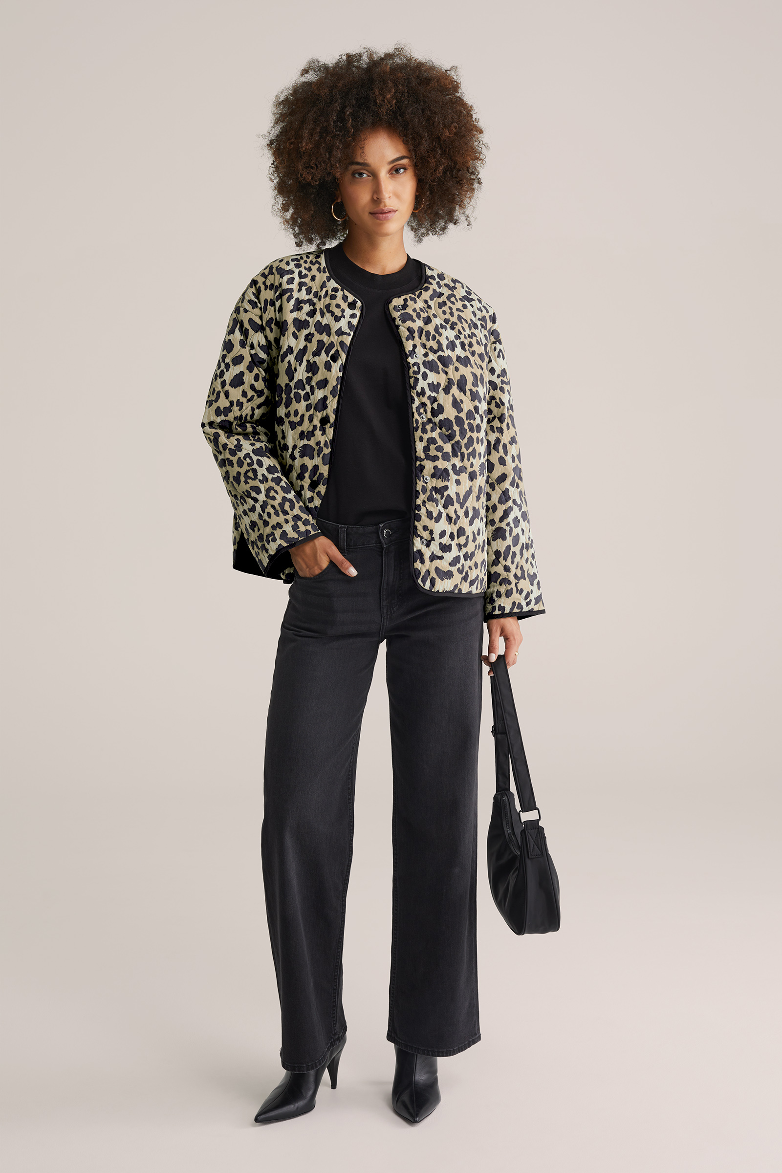 Dames gewatteerde jas met print inclusief afneembare sjaal