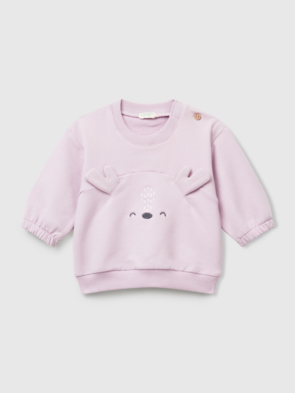 Sweatshirt with embroidery and patches