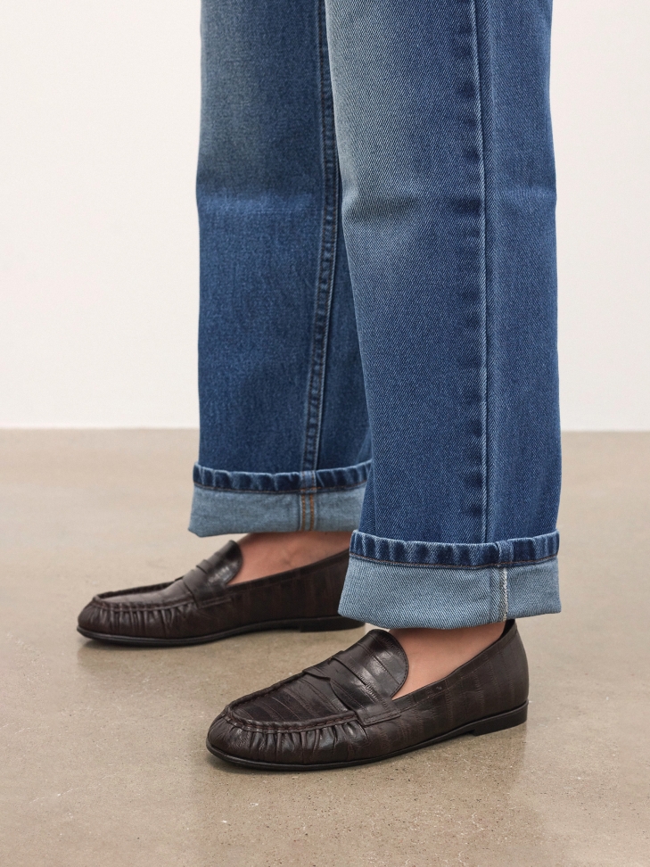 Brown shoes with embossing