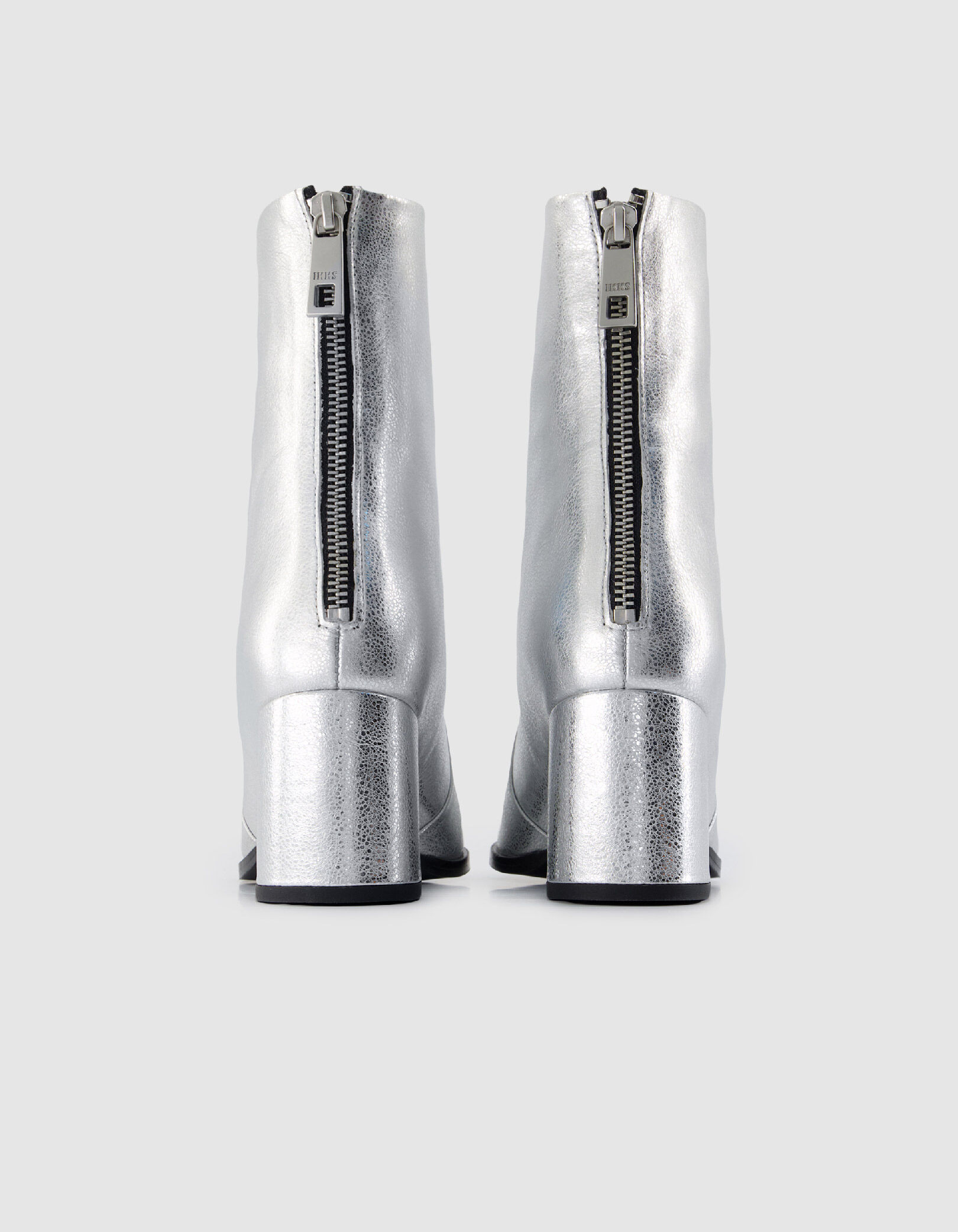 Boots à talon argentées cuir zippées Femme