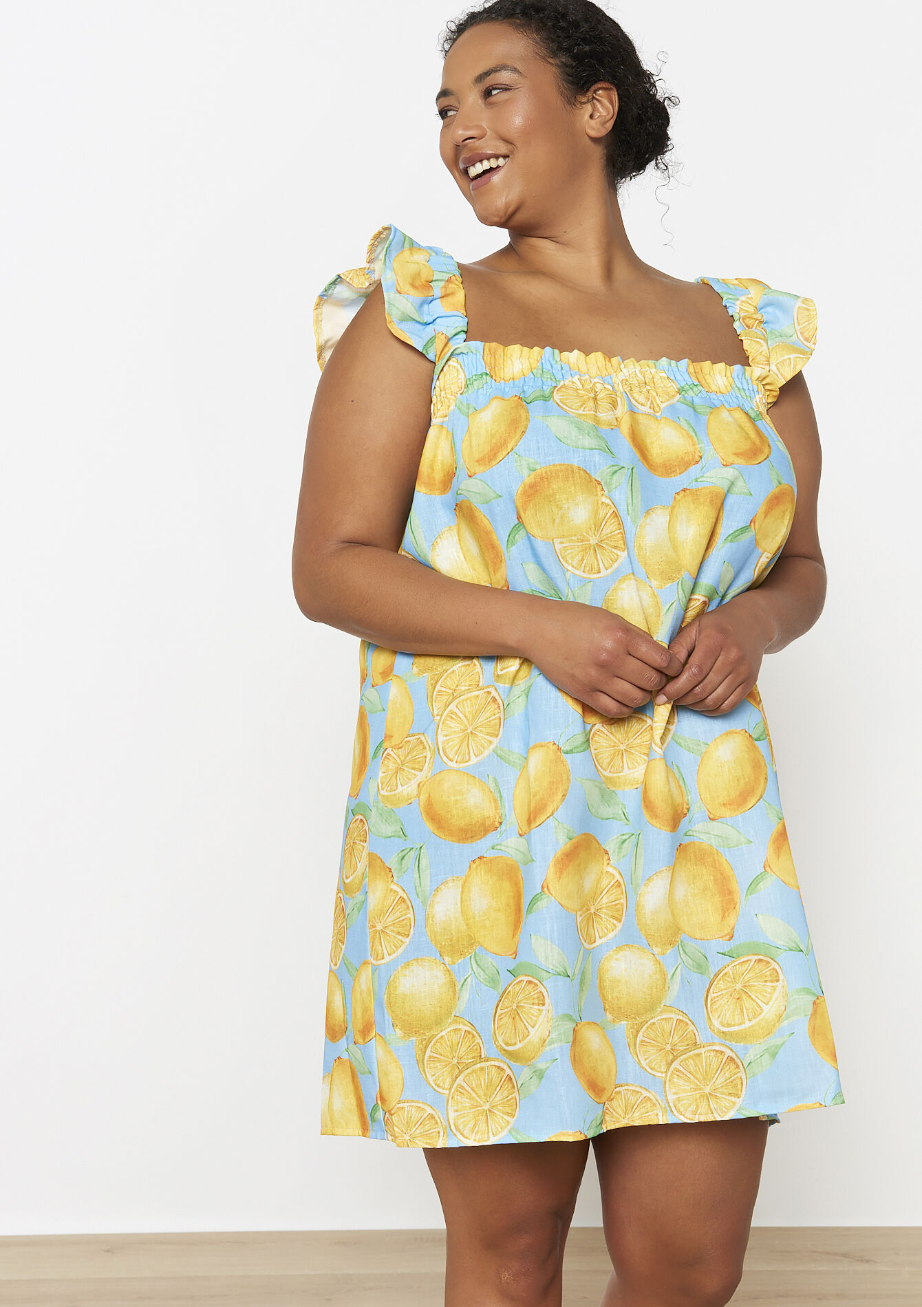 Citrusjurk met ruches