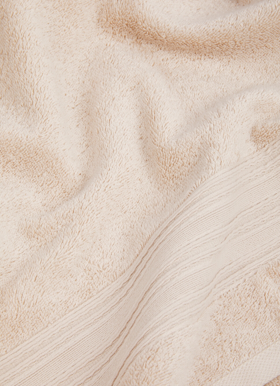 SERVIETTE INVITÉE UNI EN COTON BIO BEIGE