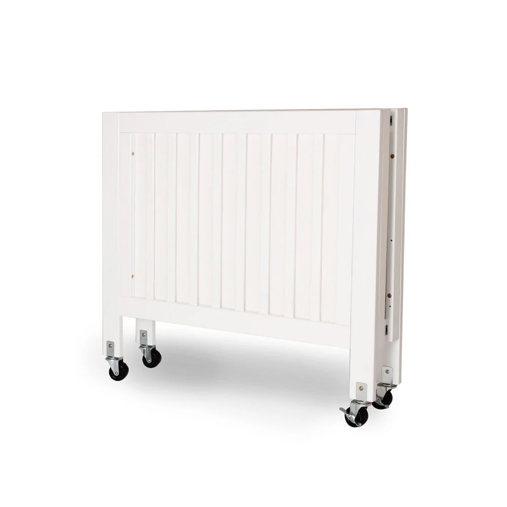 Foldable Wood and Metal Crib with Casters and Slatted Details, White