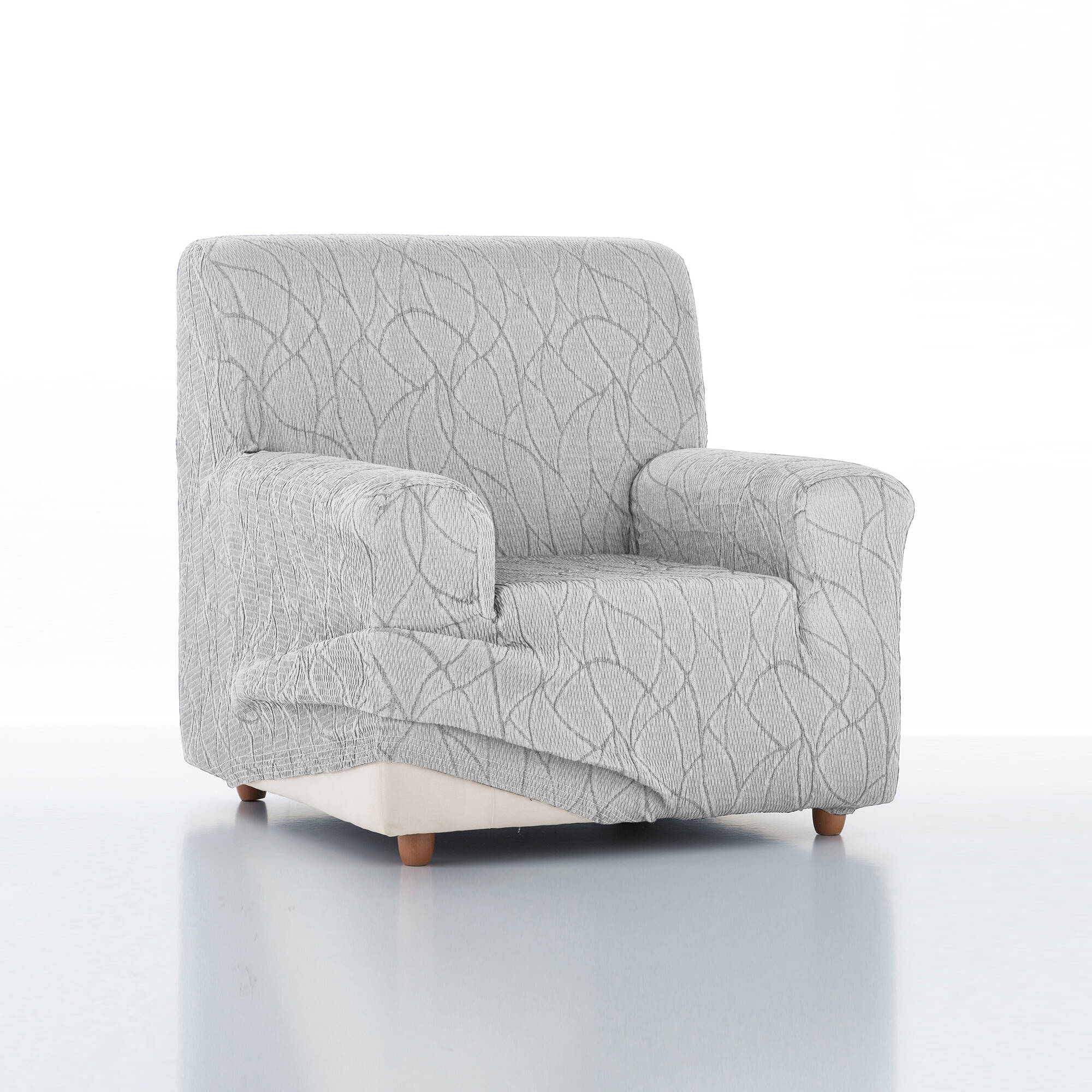 Housse extensible motif jacquard "serpentins" pour fauteuil et canapé