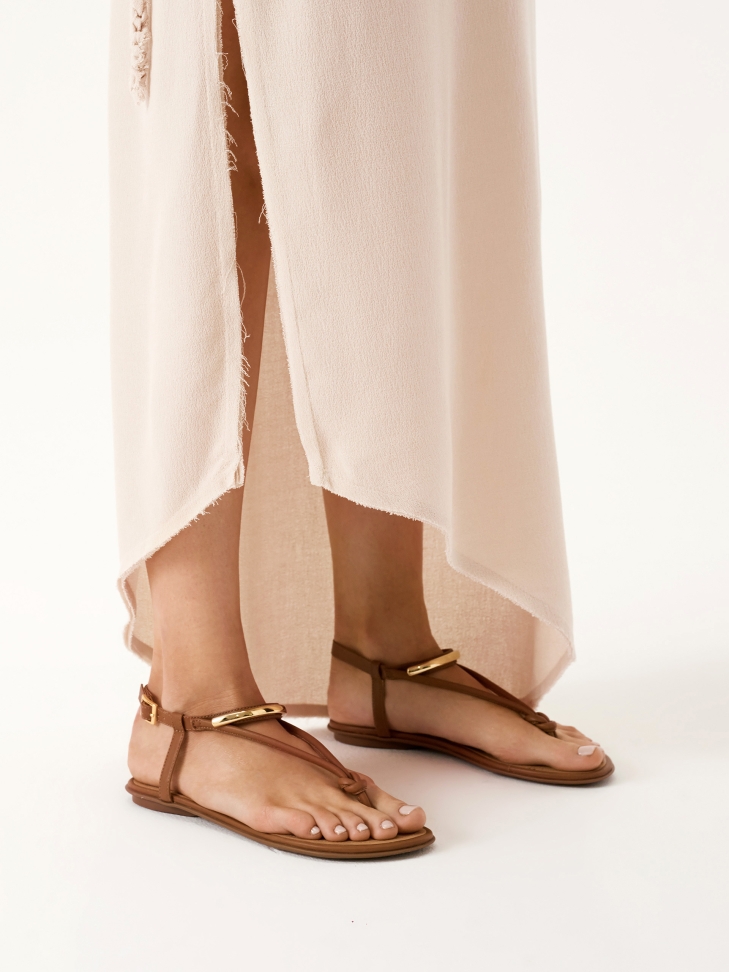 Flat brown leather flip-flops style sandals