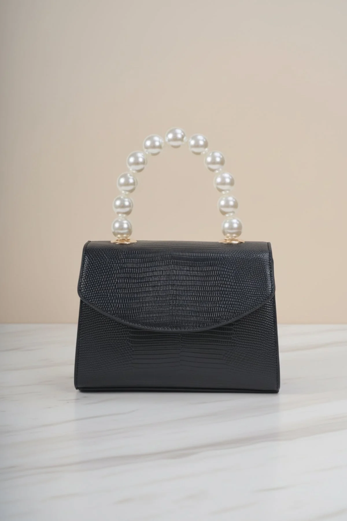Pearl Top Handle Clutch Bag in Black
