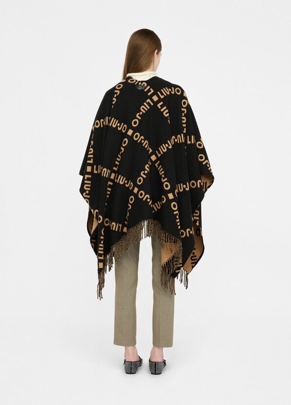 Poncho con logo e frange