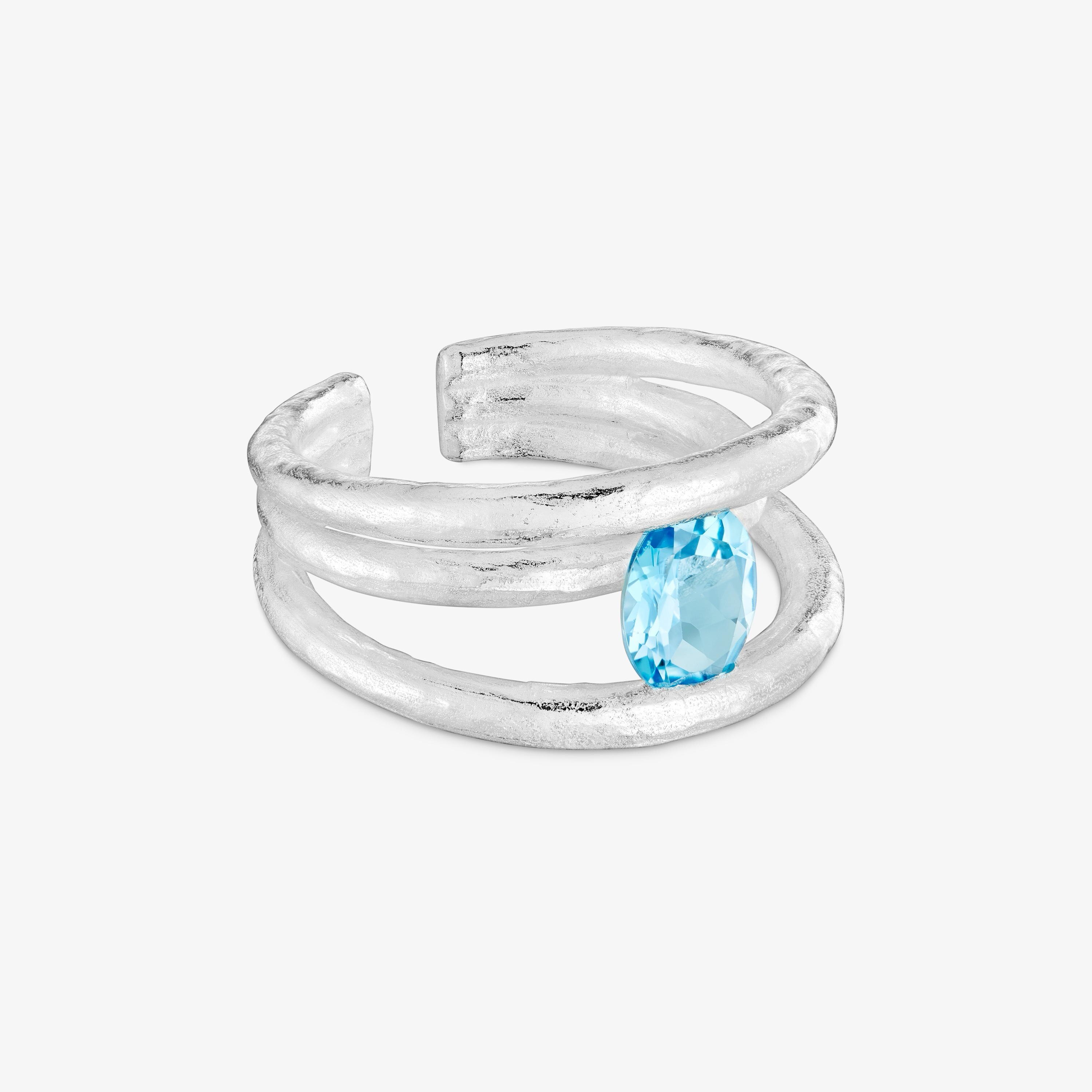 Anillo abierto de plata y topacio Duna