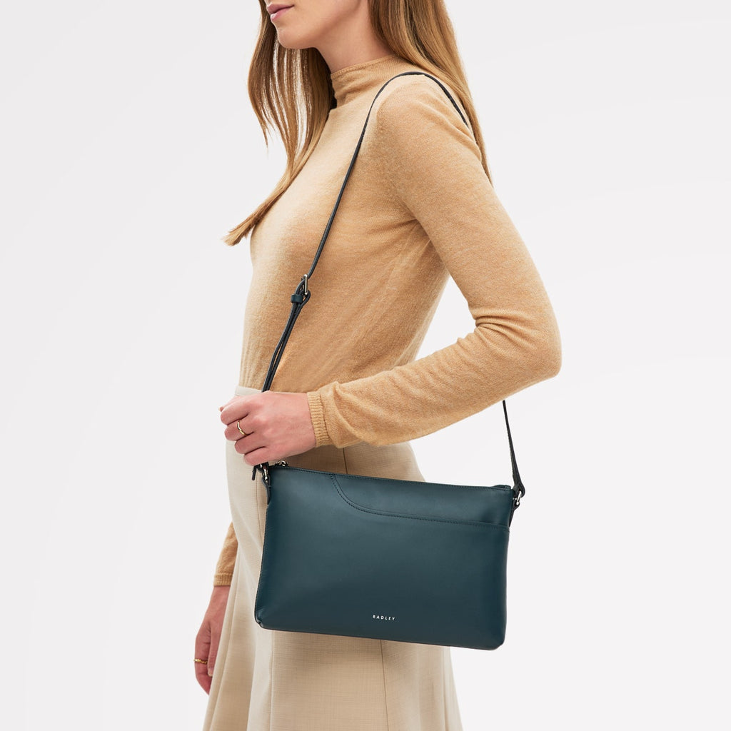 Pockets - Medium Ziptop East-West Cross Body Bag