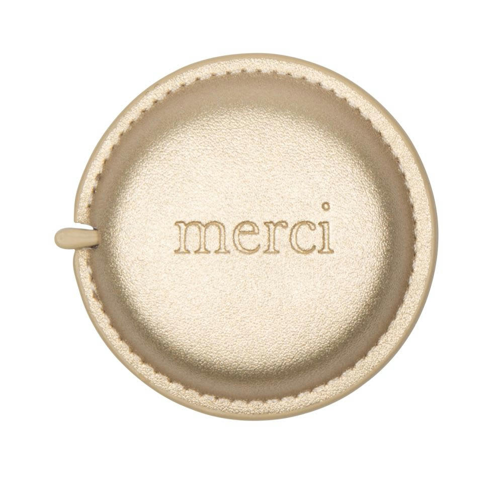 - Mètre ruban doré