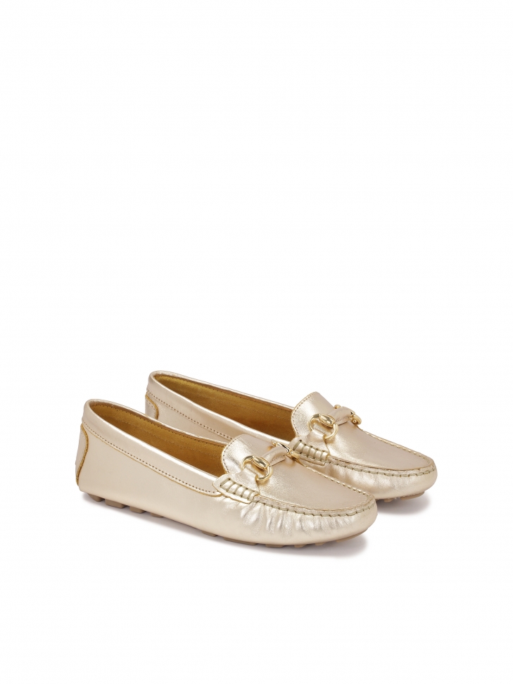 Gold classic moccasins with metal embellishment