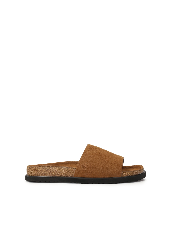 Brown suede slides on a cork sole