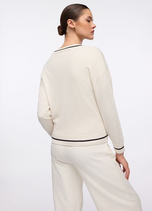 Cardigan con zip e strass