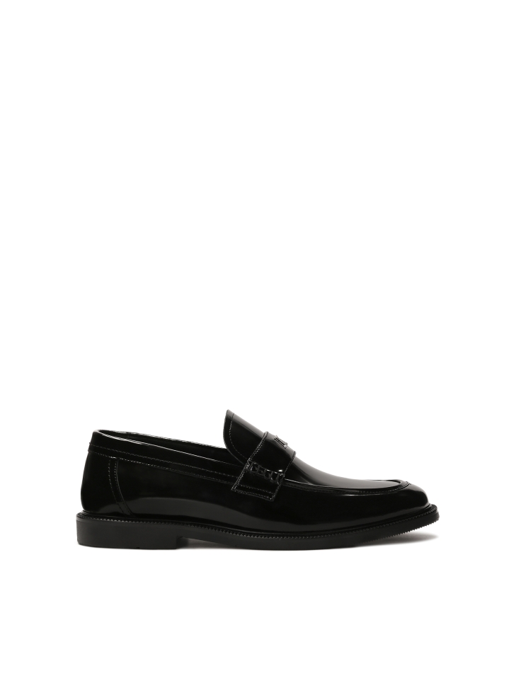 Monogrammed black slip-on loafers