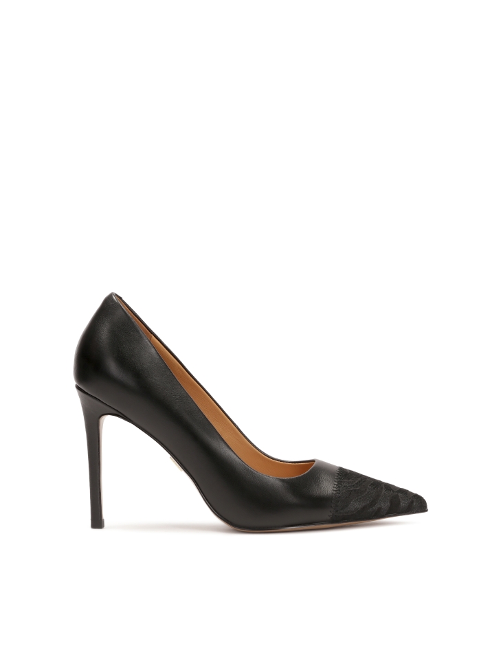 Black pumps with bristles embellished noses