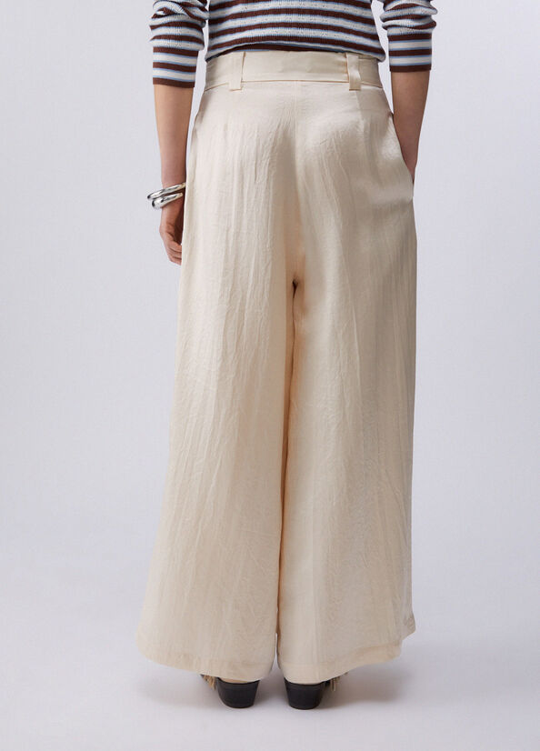 Pantaloni cropped in raso con spacchetti