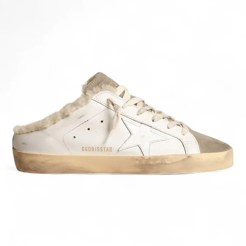 Super-Star Sabots with a white leather star and shearling lining