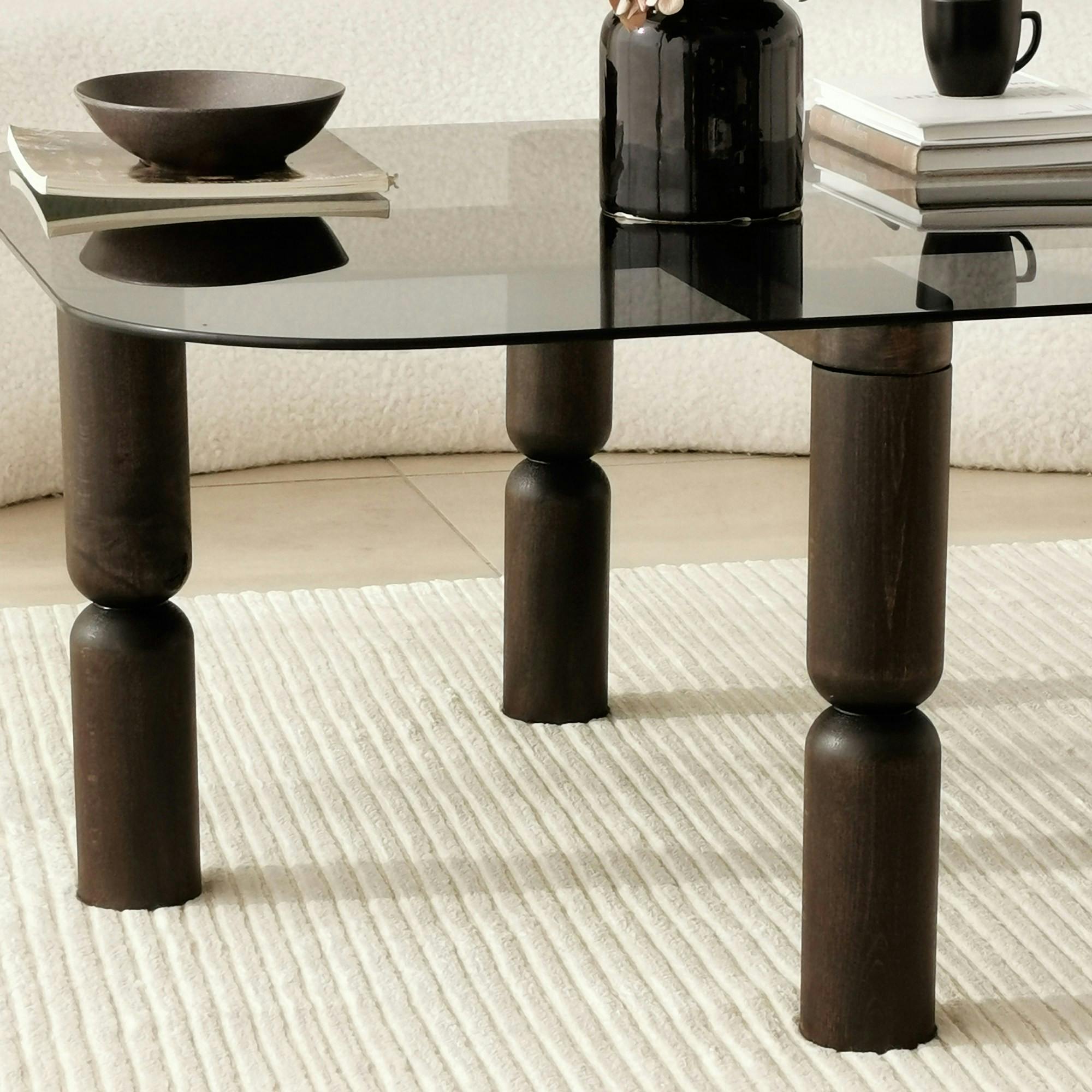 Table basse carrée en verre fumé - pieds bois sculpté BOMA