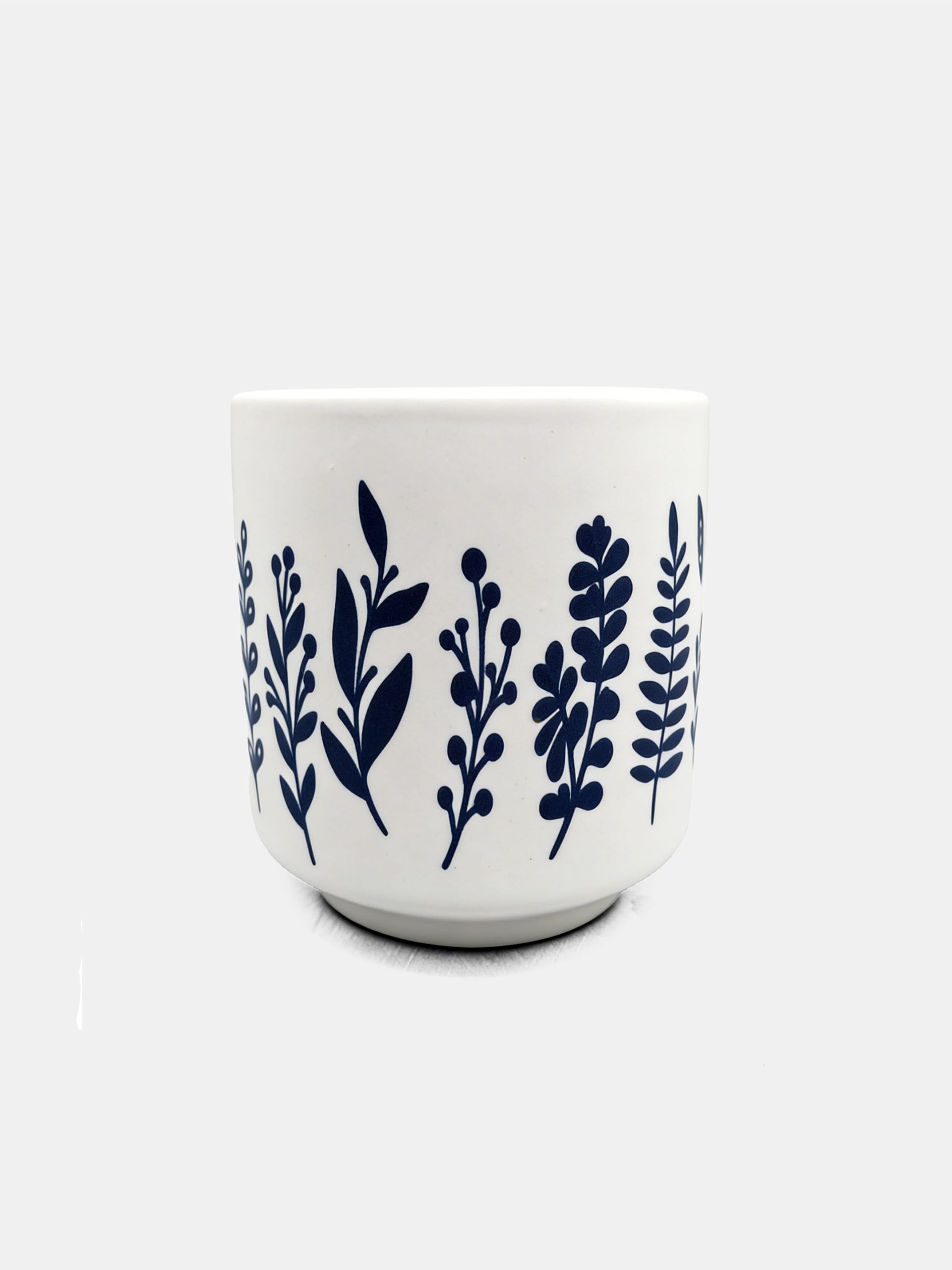 Ceramiczna doniczka z motywem roślinnym