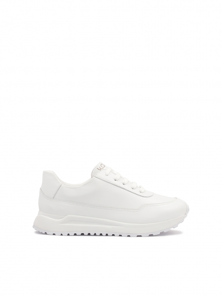 Leather white sneakers on a comfortable sole