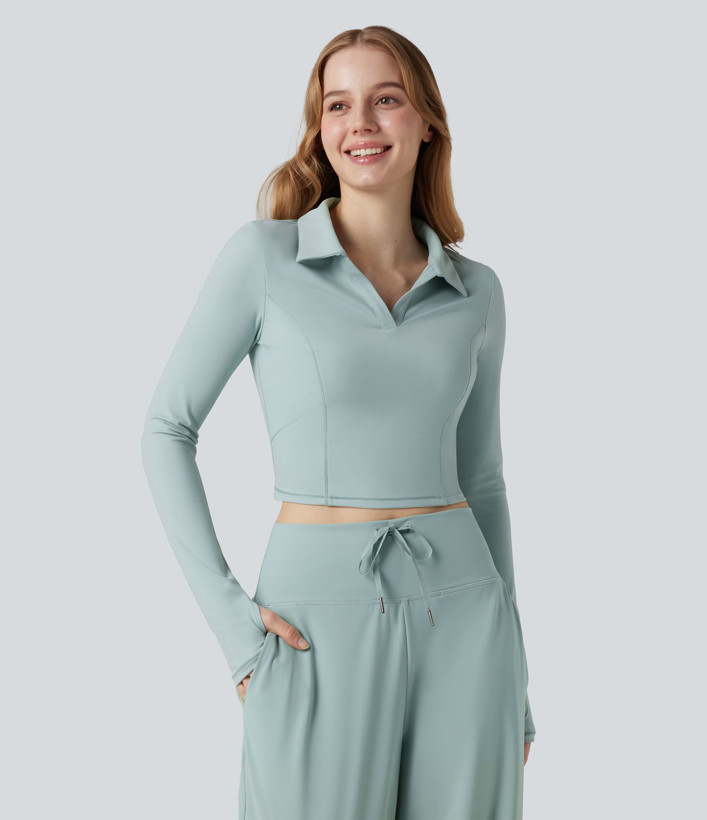 Top de sport tennis SoftlyZero™ Plush court col polo manches longues avec trous pouces