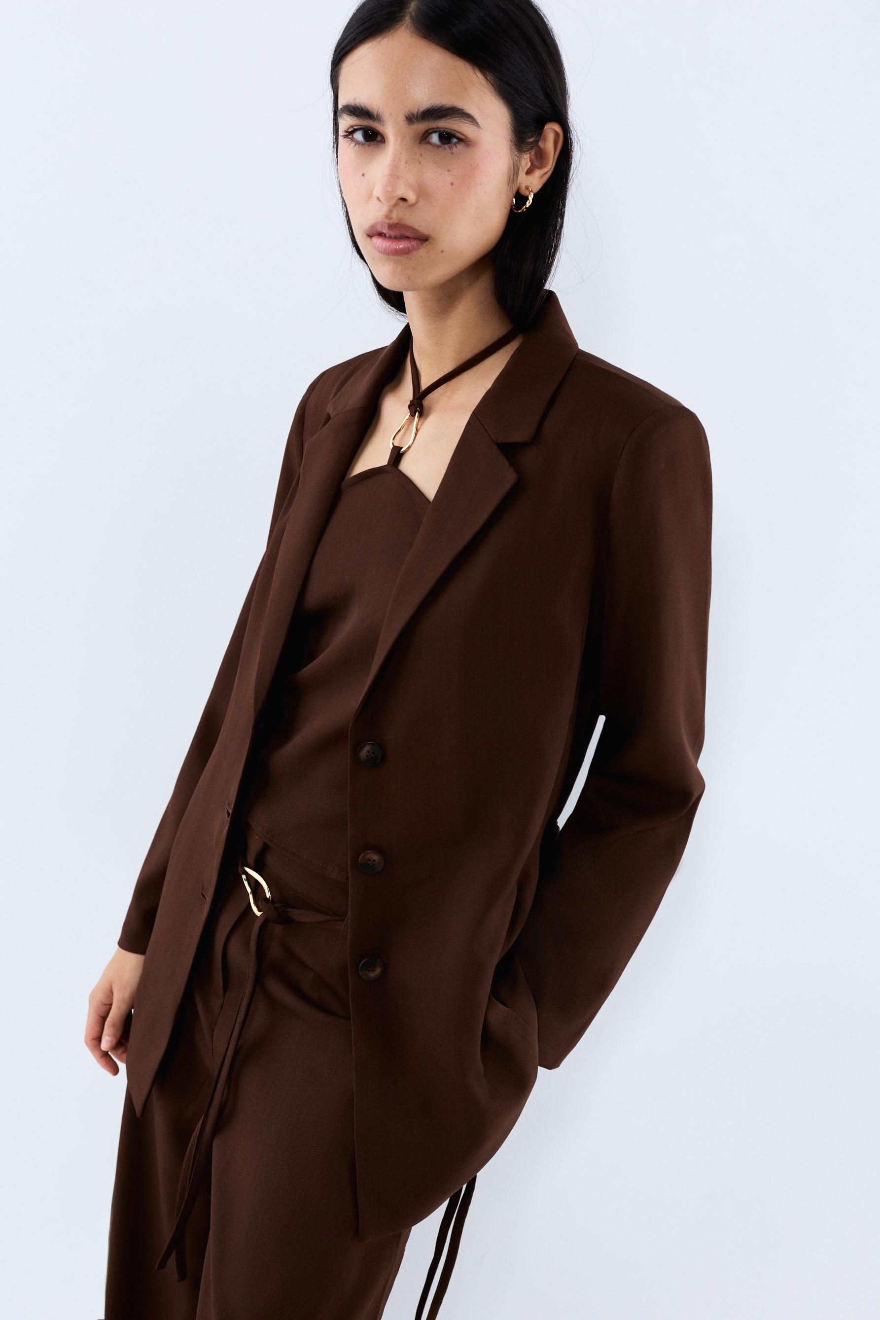 Blazer anilla dorada