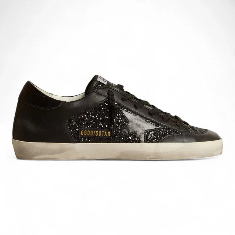 Super-Star in black nappa and glitter with glossy black leather star
