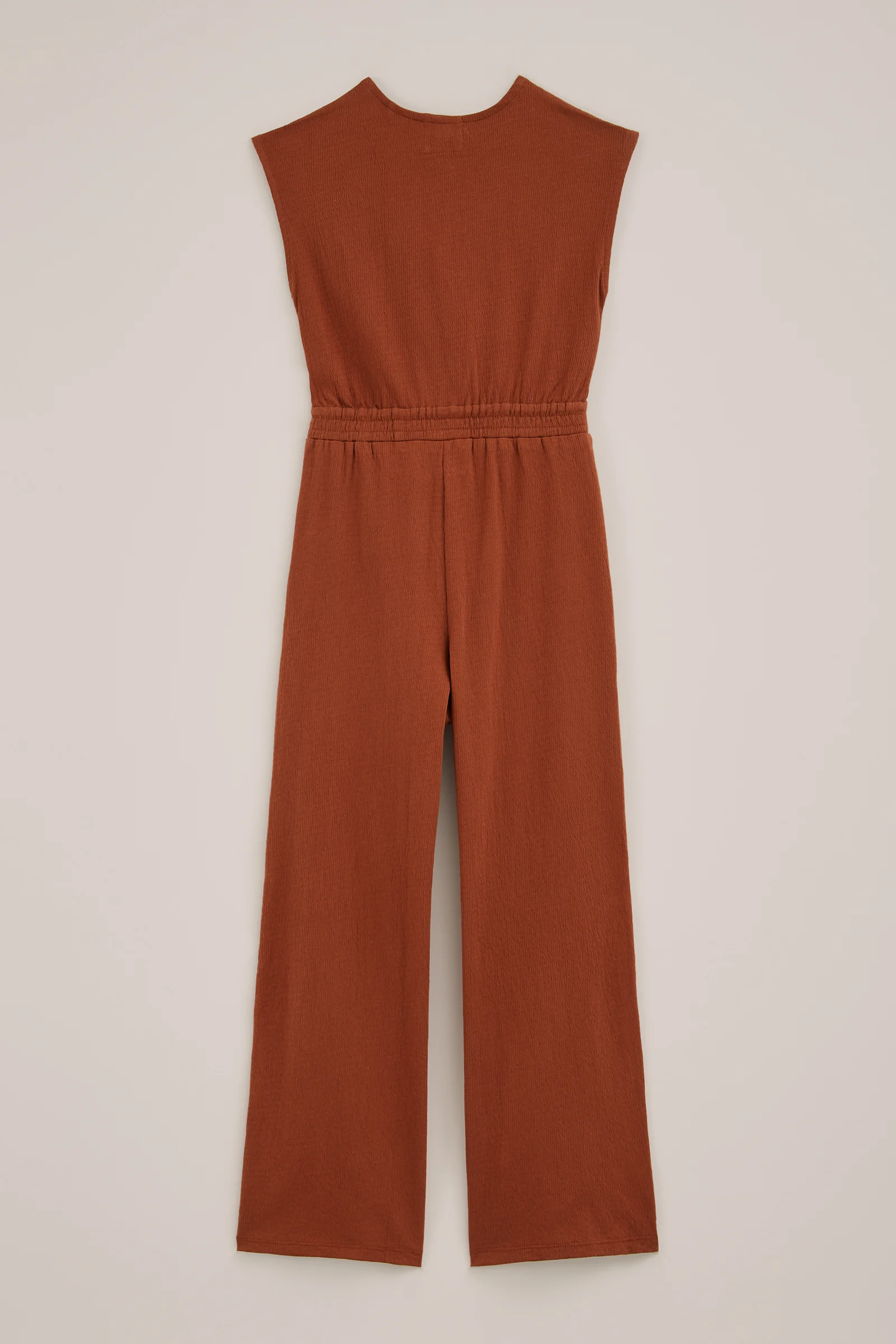 Meisjes jumpsuit met structuur en knoopdetail