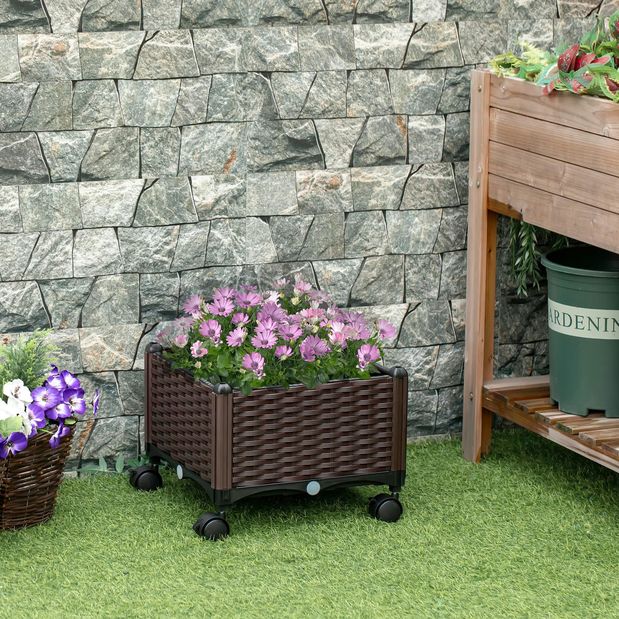 - Jardinière sur roulettes plastique imitation rotin tressé chocolat