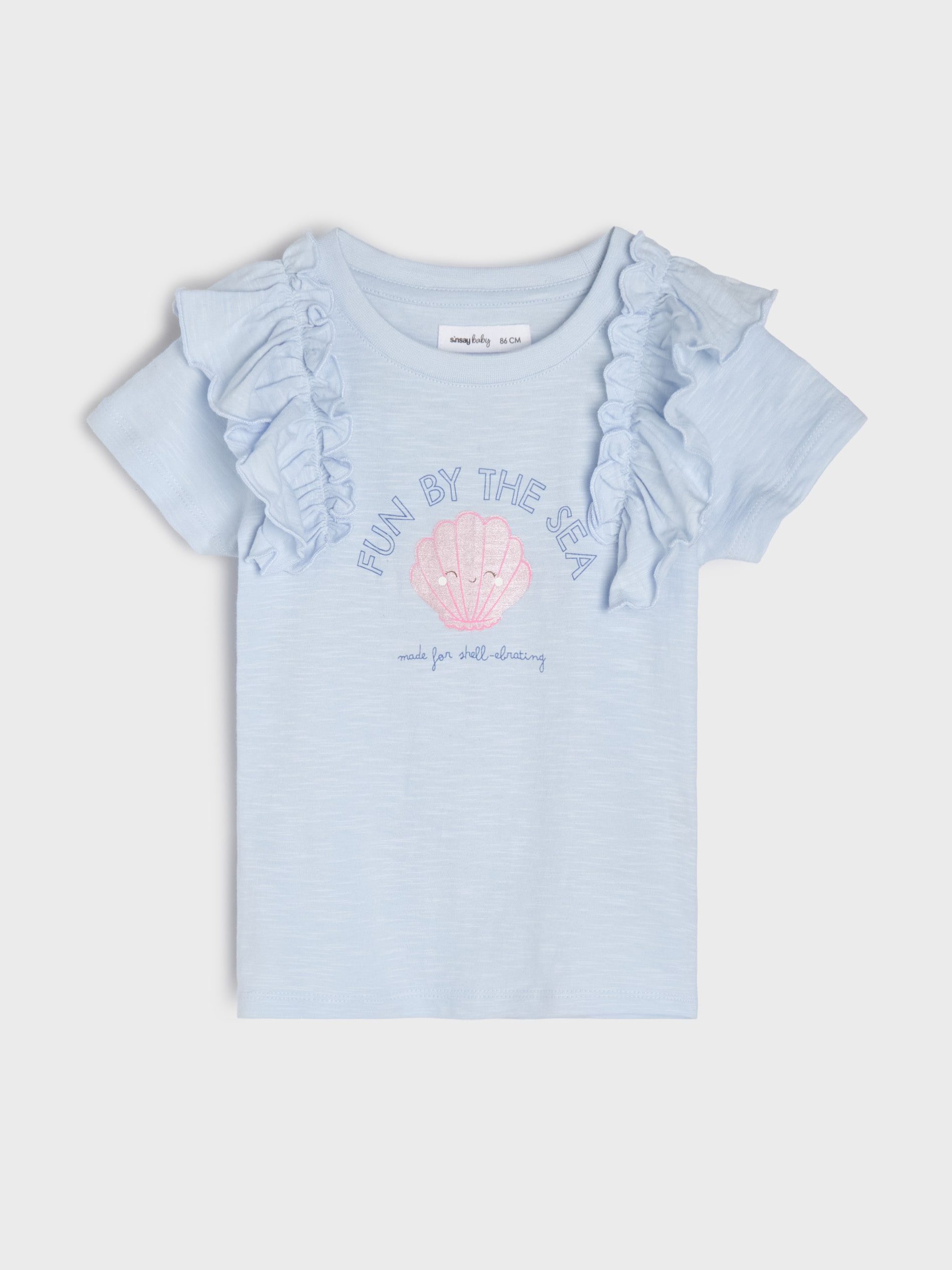 Bawełniana koszulka z nadrukiem i ozdobnymi falbanami