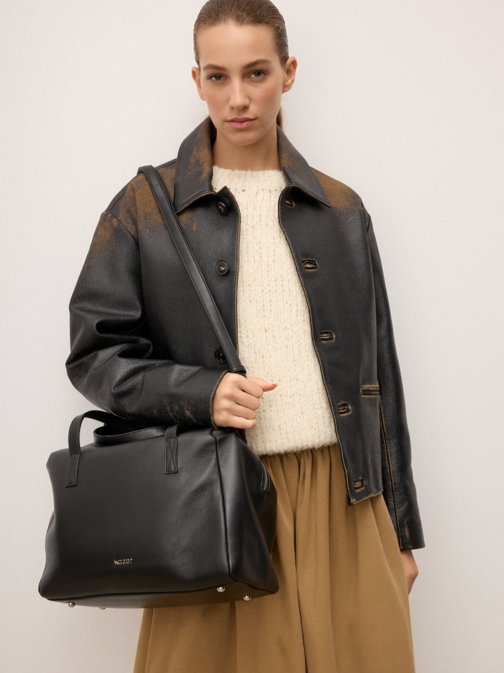 Leather handbag with handles and strap