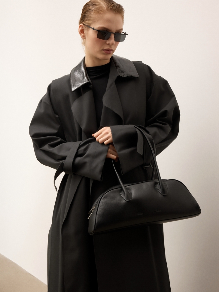 Fashionable baguette shaped handbag