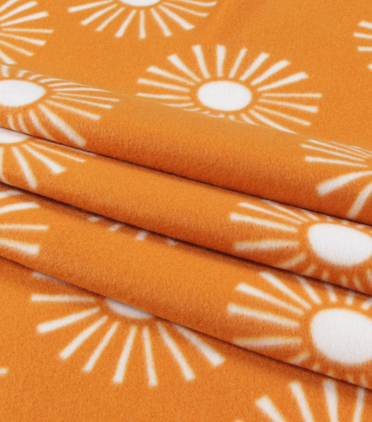Suns on Mustard Blizzard Fleece Fabric