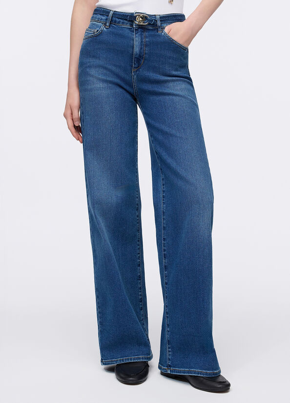 Jeans flare cropped con cintura