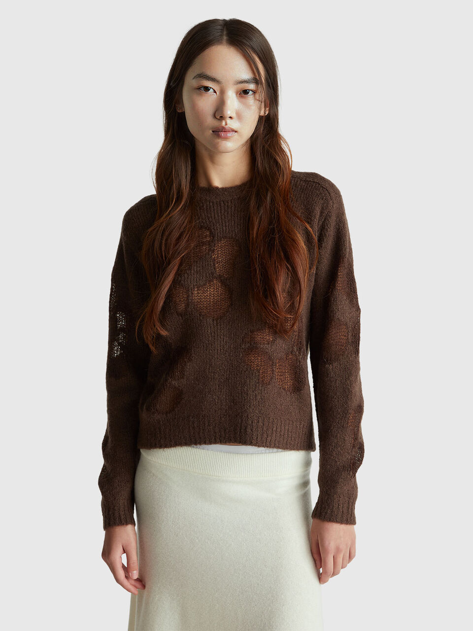 Sweater with floral inlay