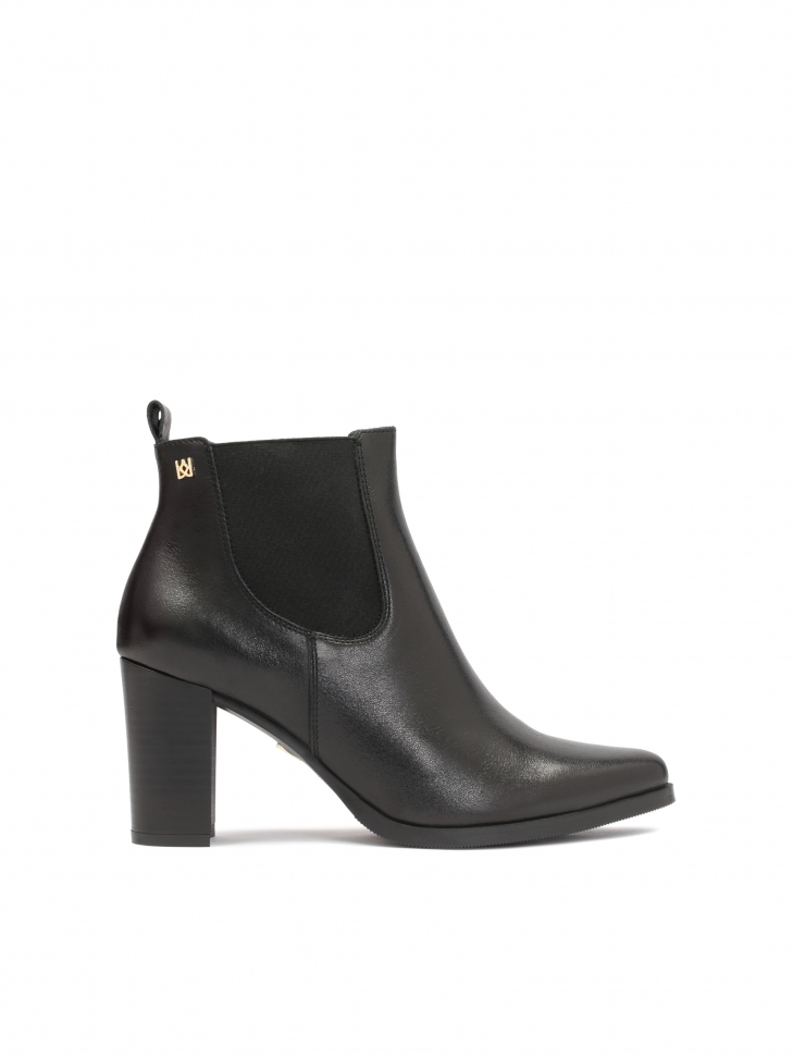 Black minimalistic booties with elastic rubbers in the upper