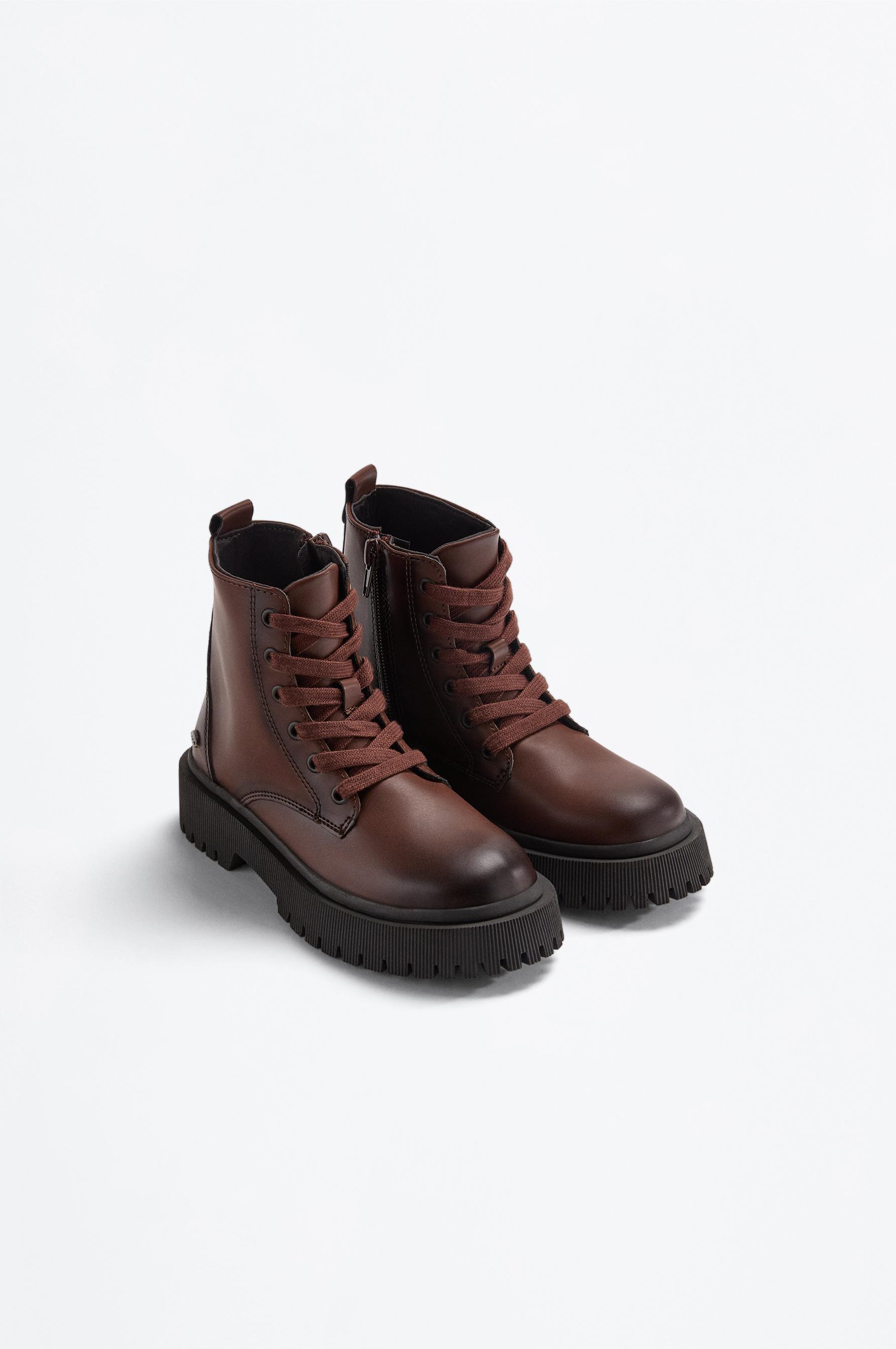 Bota suela track