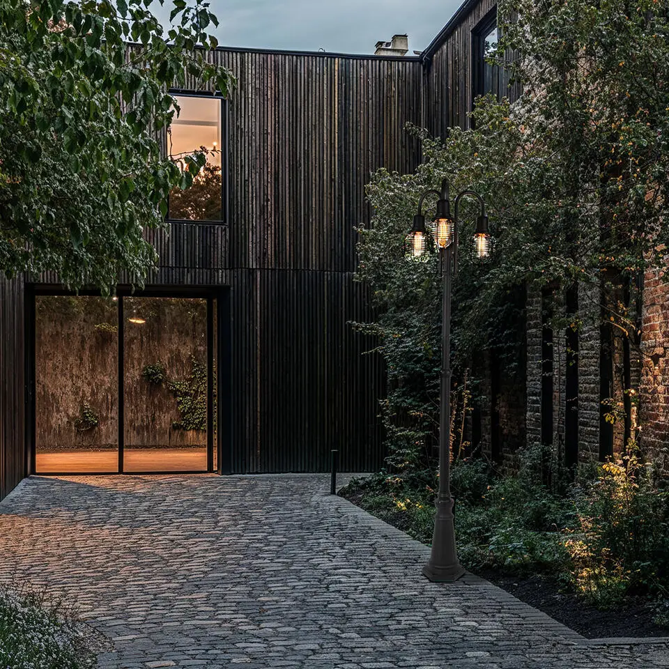 Qazqa wandlamp met bewegingssensor guardado zwart e27