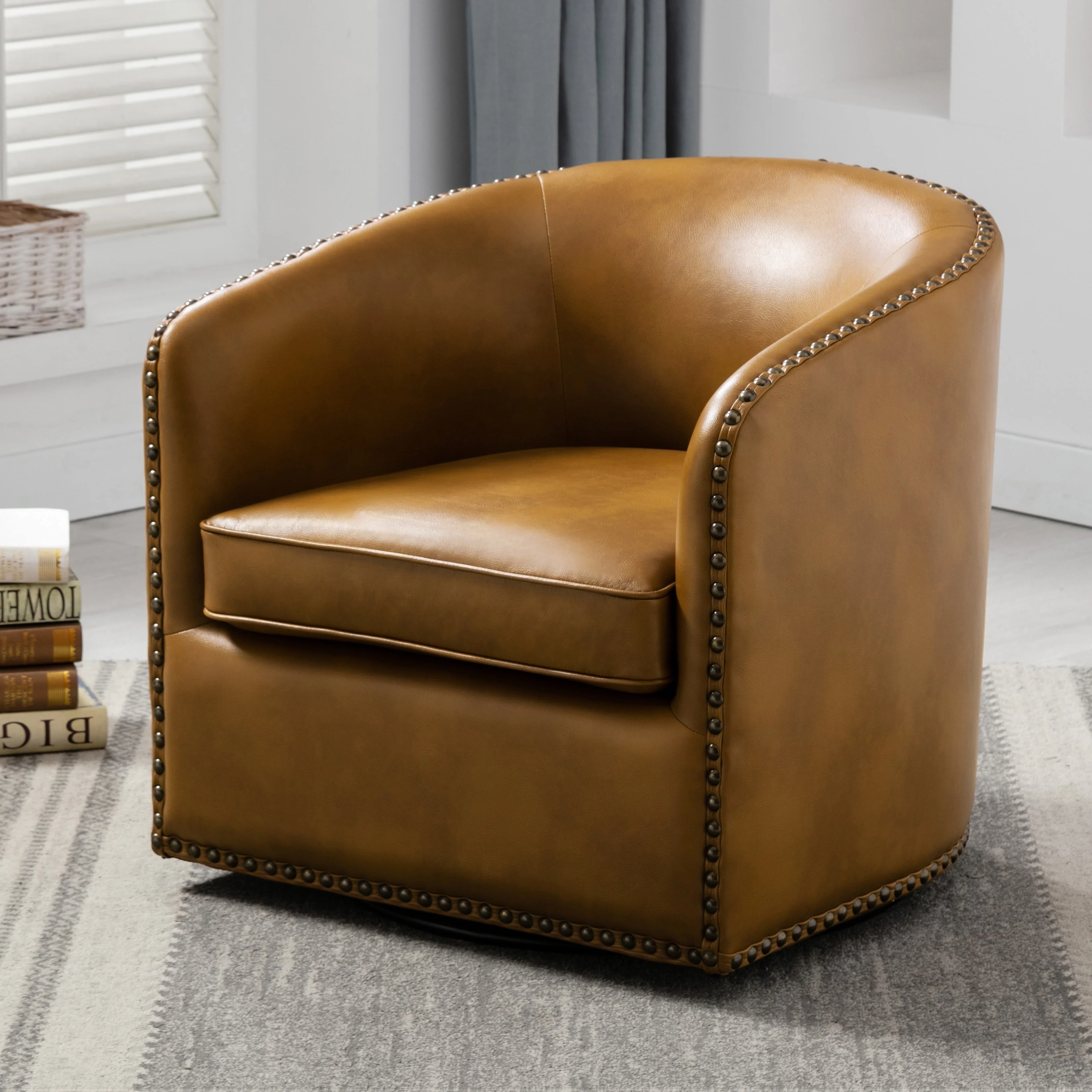 Truman Faux Leather Swivel Arm Chair with Nailhead Trim by Greyson Living