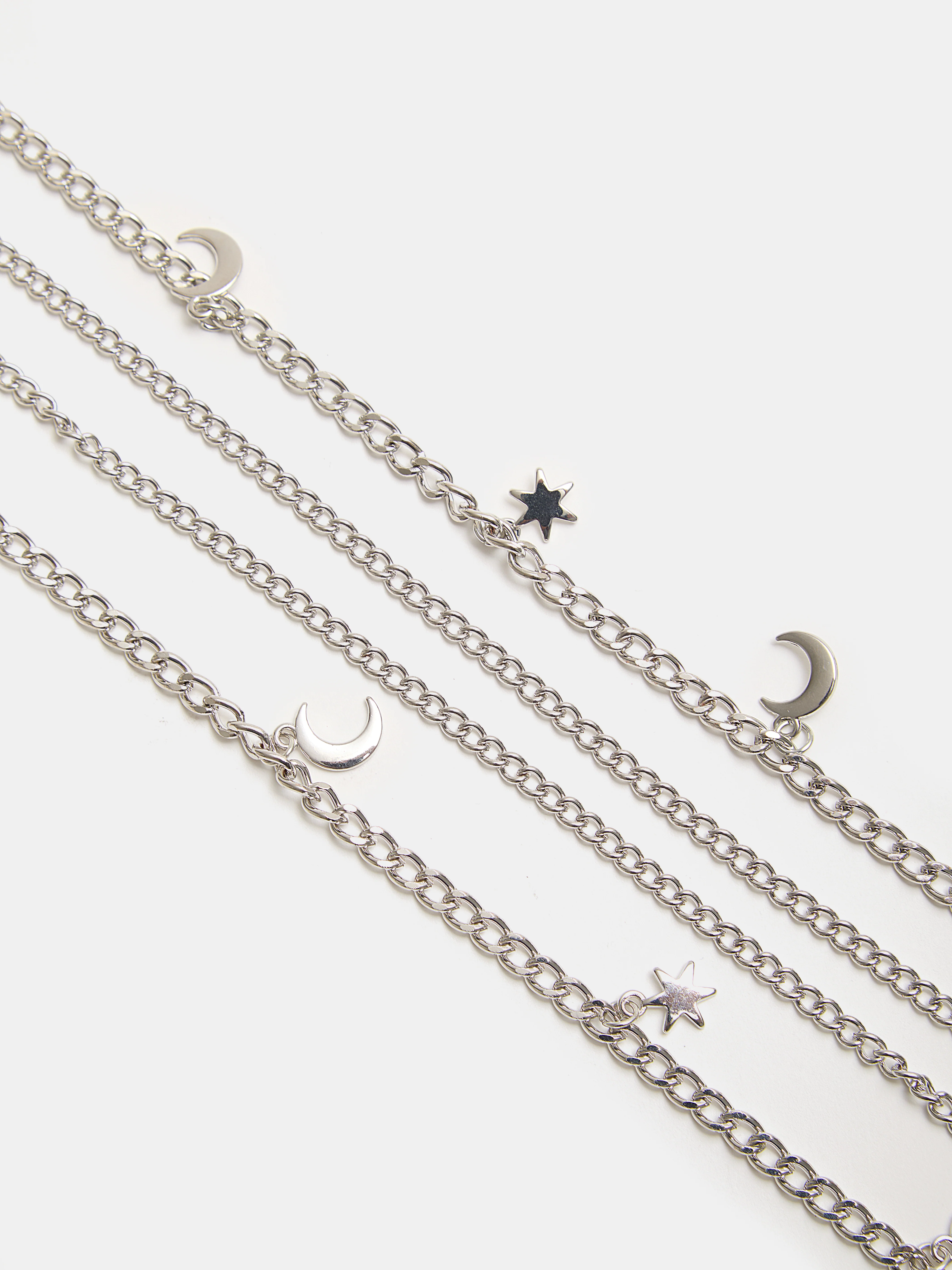 Ceinture chaîne double rangée avec étoiles et lunes