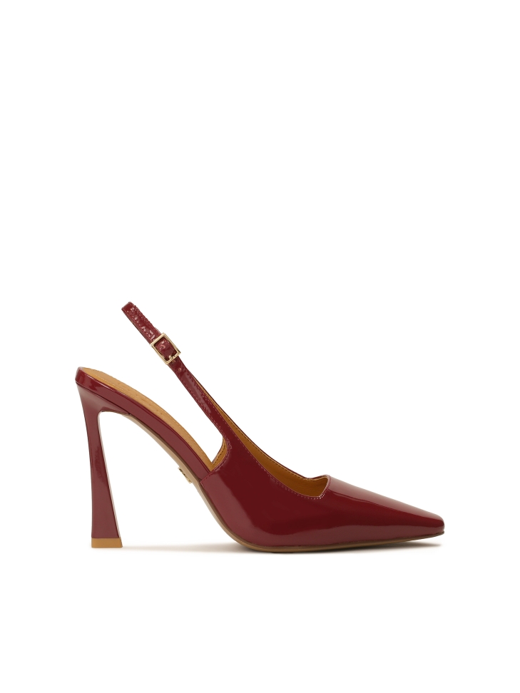 Maroon patent leather pumps with an interesting heel