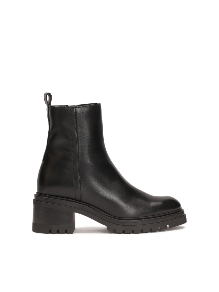 Black heeled boots with a simple upper