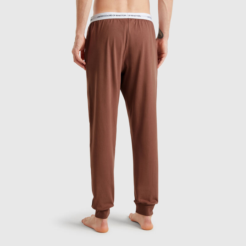 Trousers with elastic logo