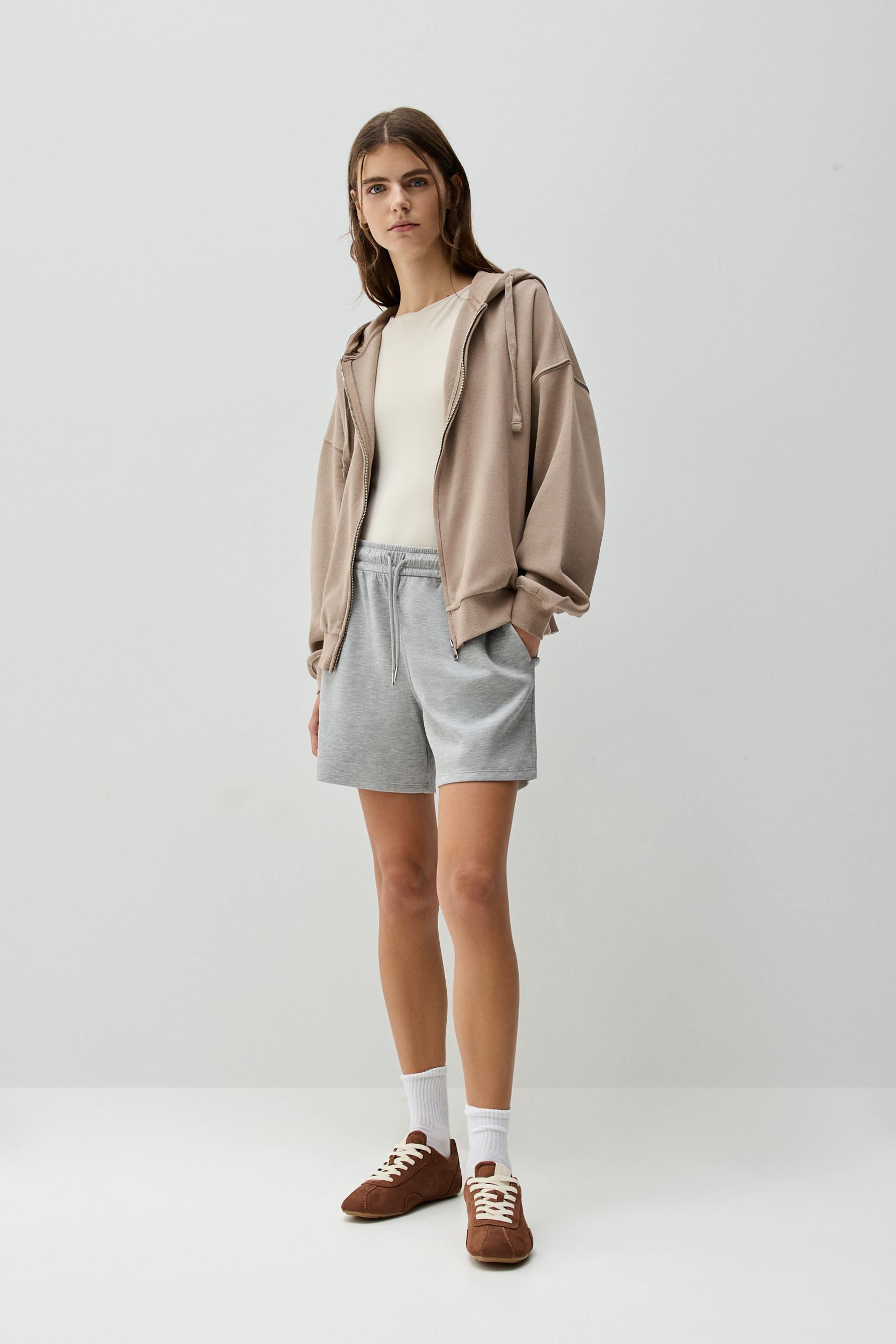 Sudadera cremallera oversize