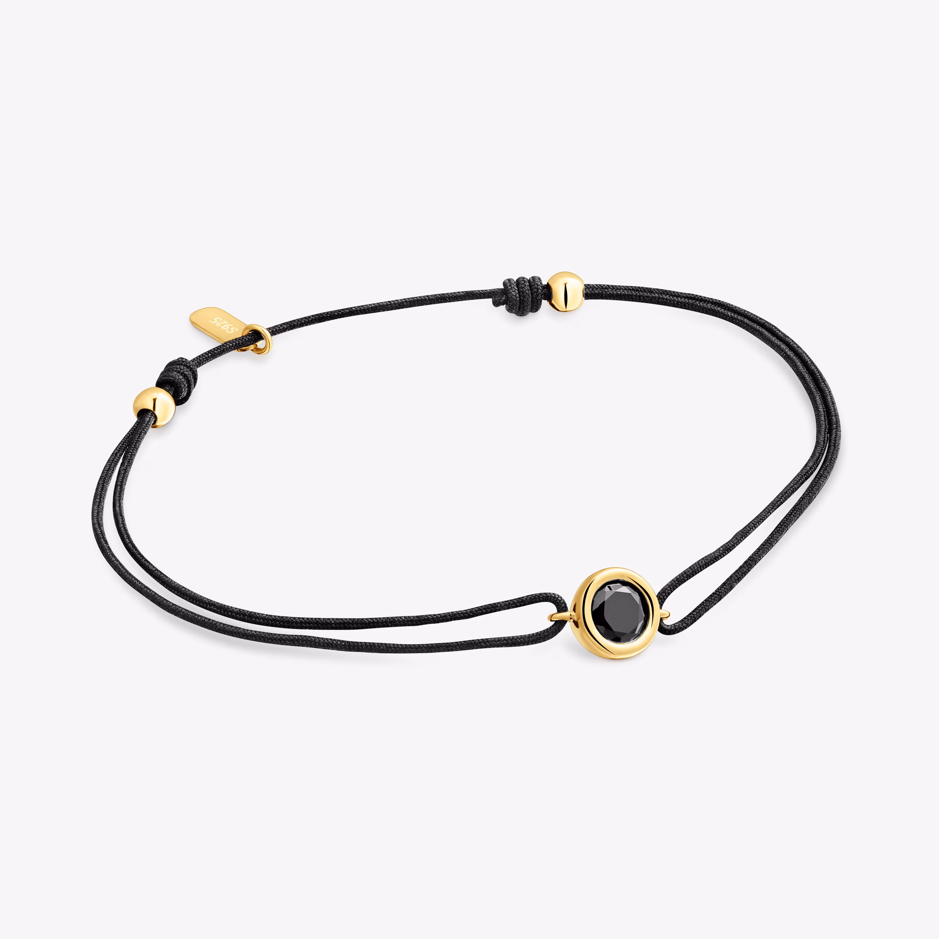 Pulsera de nylon negro con baño de oro 18 kt sobre plata y espinela negra Line