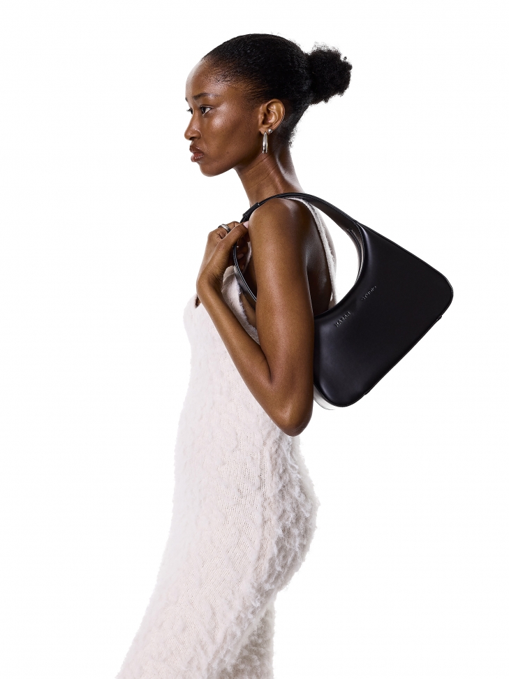 Sleek black handbag with smooth face