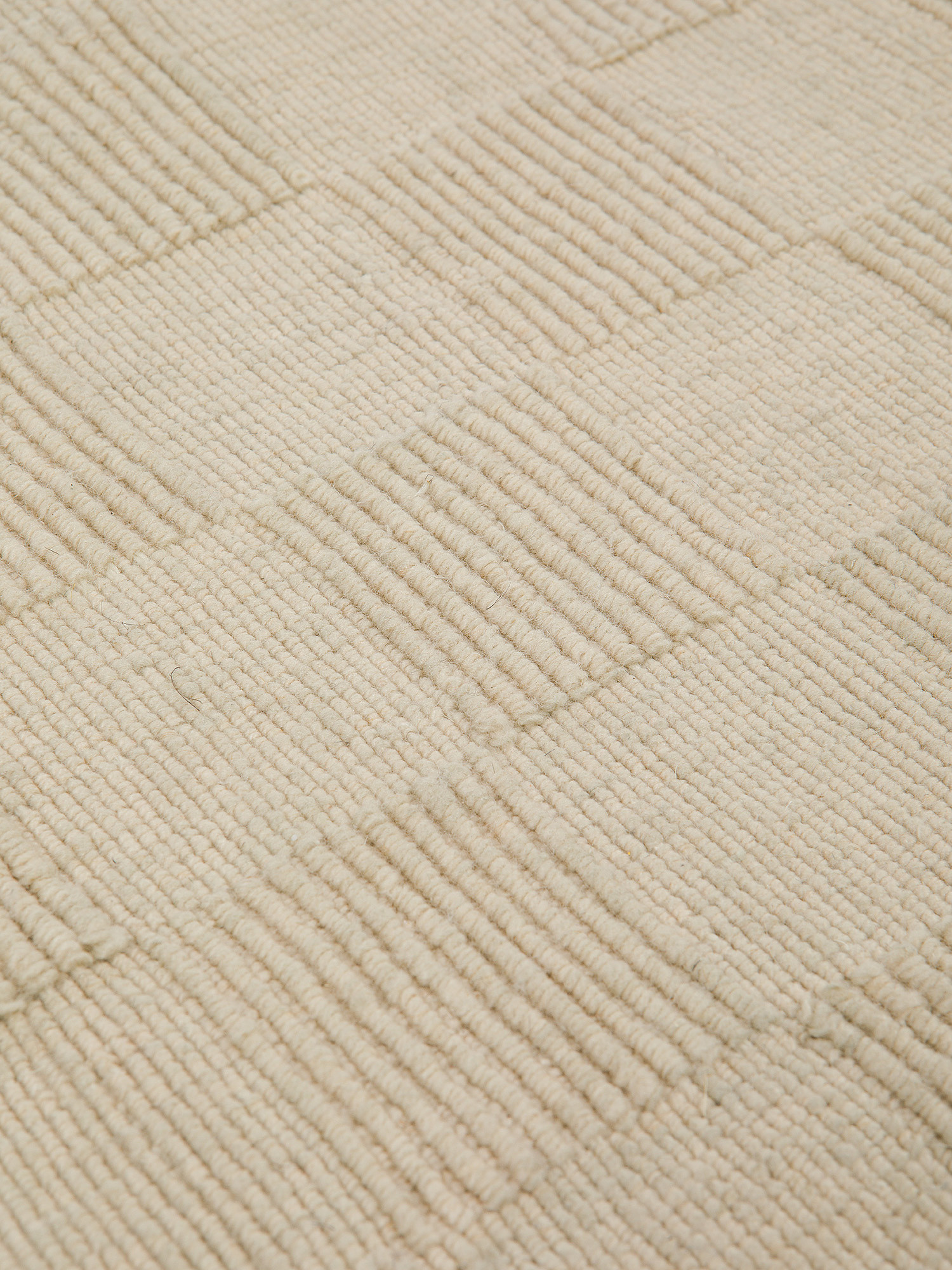 Tappeto 120x180 cm con motivo geometrico.