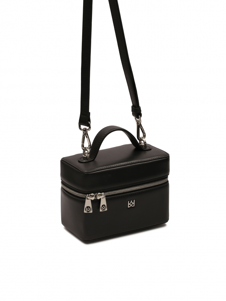 Small leather makeup bag with strap