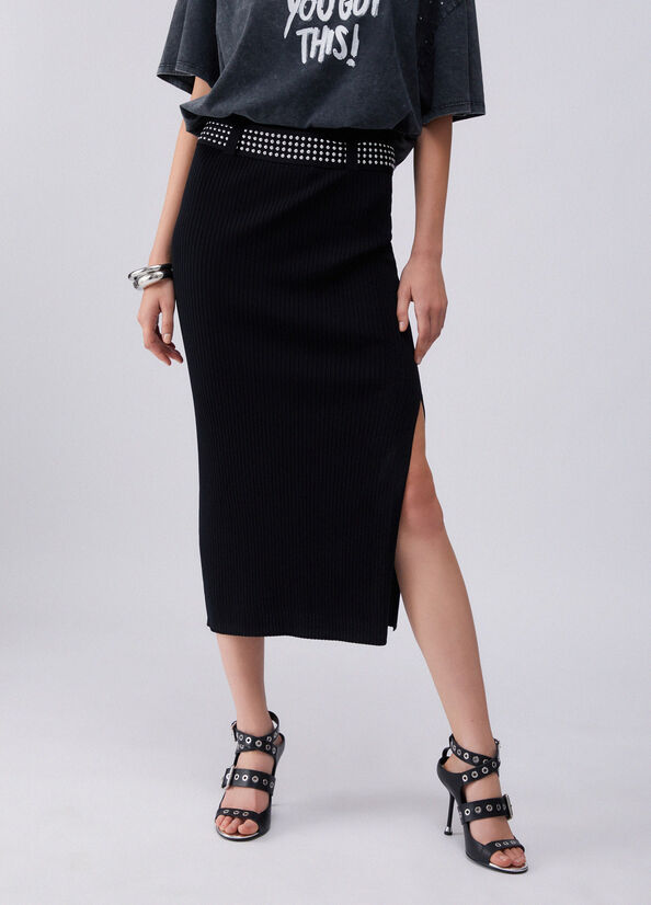 Longuette in maglia con borchie