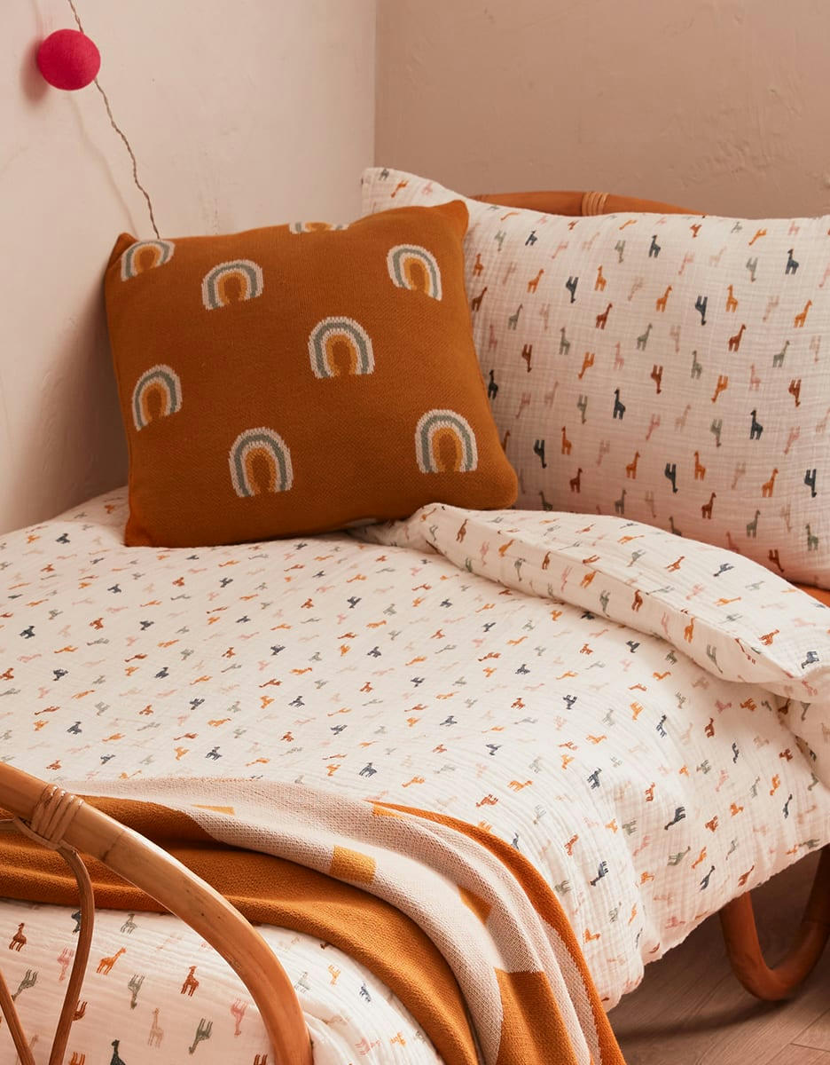 - Coussin tricot en jacquard BIO, ocre